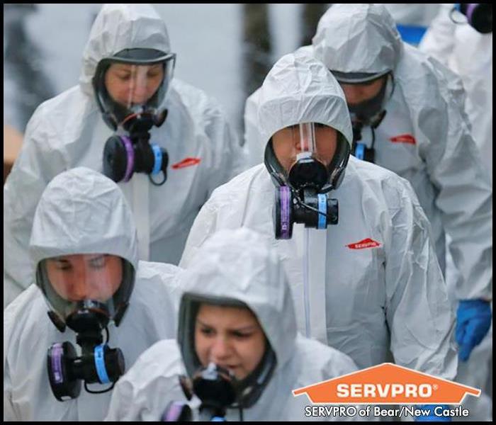Servpro crew in PPE on a COVID-19 cleaning & disinfecting job