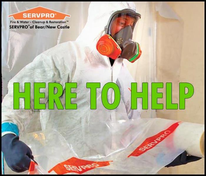 SERVPRO professional in full PPE
